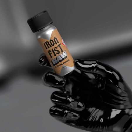 Iron Fist Raw Poppers - Hand in glossy black latex glove grasping 24ml "Iron Fist Raw Ultramyl Biopure" bottle, featuring brown wood-texture label on metallic container with black cap, moody monochromatic styling.